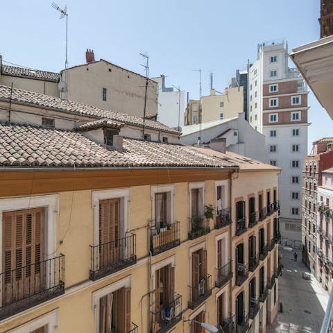 Feel like a proper Madrid local and enjoy views of the surrounding city from the window