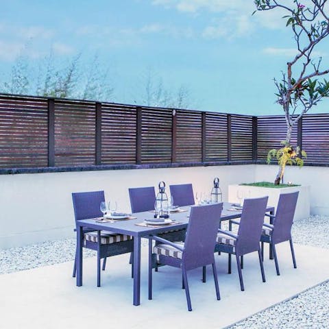 Enjoy delicious alfresco feasts in the elegant outdoor dining area 