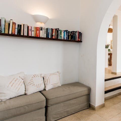 Curl up with a good book and the squishy sofas in the living area