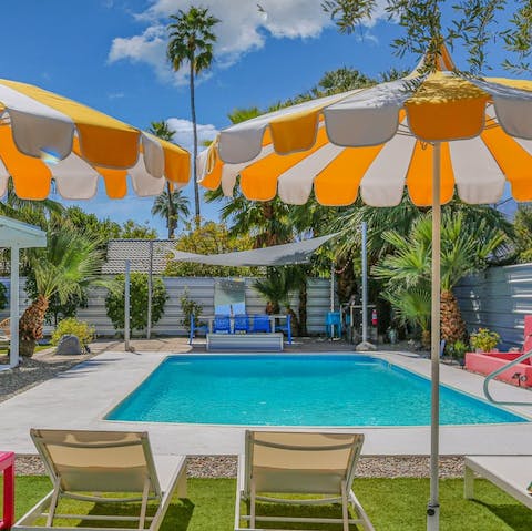 Work on your tan as you lounge by the sparkling swimming pool
