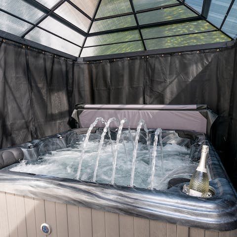 Relax in the hot tub after a busy day of sightseeing