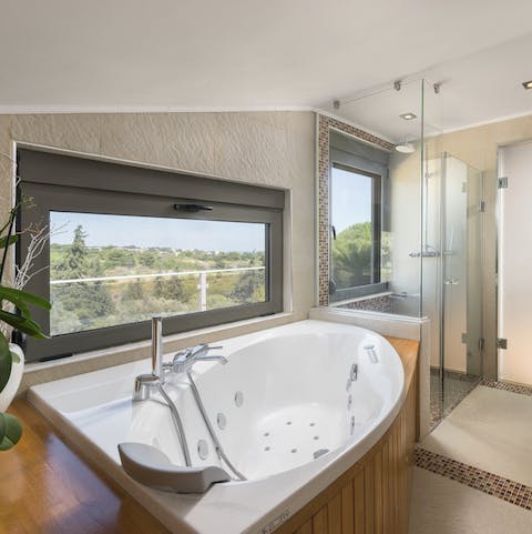 Soak weary feet in the main bathroom's Jacuzzi tub after a long day exploring