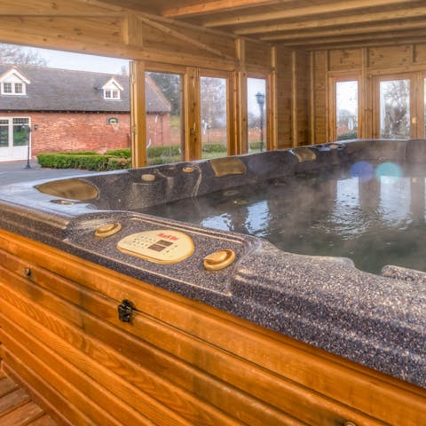 Soak tired muscles in the warm and bubbly jacuzzi