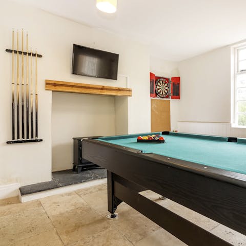 Get competitive at the home's well-equipped games room