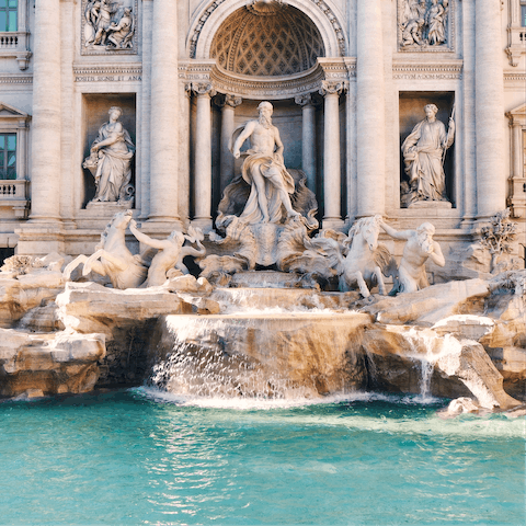 Admire the beauty of Trevi Fountain, about seven minutes by foot from your front door