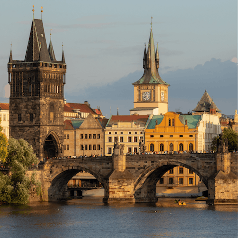 Start your day with a relaxing stroll along the Vltava River, a stone's throw from home