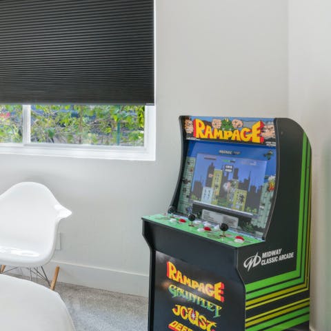 Embrace the retro vibes with a game of Rampage or Asteroids in the second bedroom