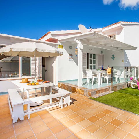 Lay the table for brunch on the sunny terrace