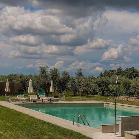 Spend days poolside, taking a dip in the communal pool whenever it gets a bit hot