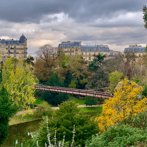 Bring a picnic to the Parc des Buttes-Chaumont, a sixteen-minute walk away