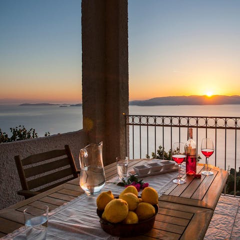 Share a bottle of wine and dine alfresco as the sun slowly sets on the horizon