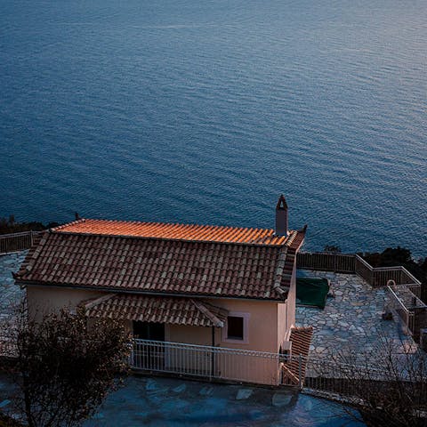 Stay in a peaceful, rural villa overlooking the Aegean Sea