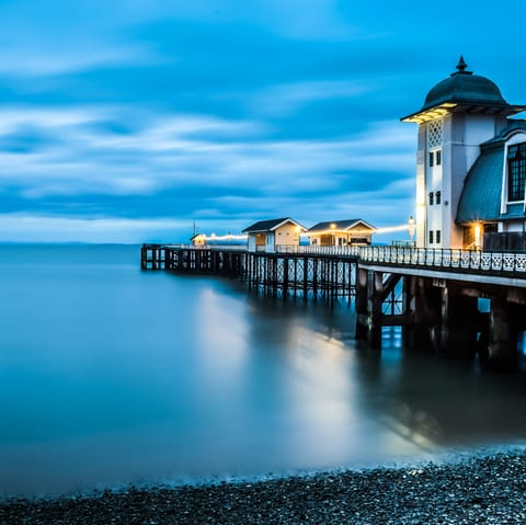 Stroll down the the beautiful art deco Penarth Pier Pavilion, a little over half a mile down the road