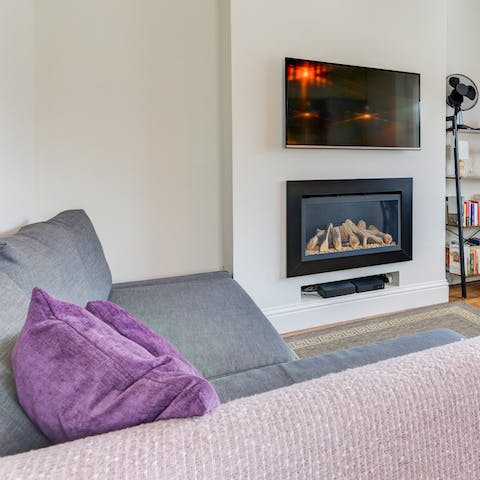 Snuggle up by the fire after a crisp walk along the seaside