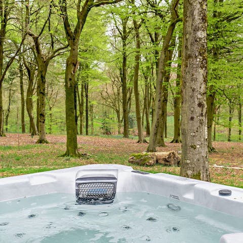 Embrace the natural elements while soaking in the hot tub