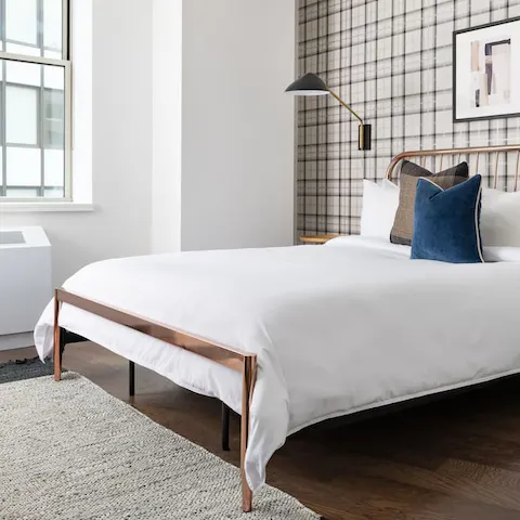 Sleep well amid contemporary minimalism in the queen-sized bed