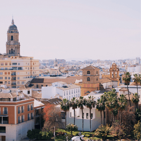 Wander the streets of the charming coastal city of Malaga