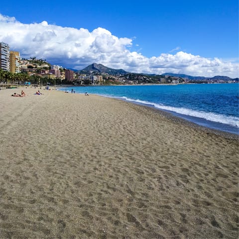 Spend the day by the sea at Malagueta Beach, within a fifteen–minute drive away