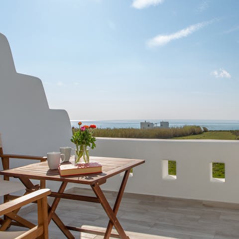 Soak up the sea views over morning coffees on the bedroom's balcony