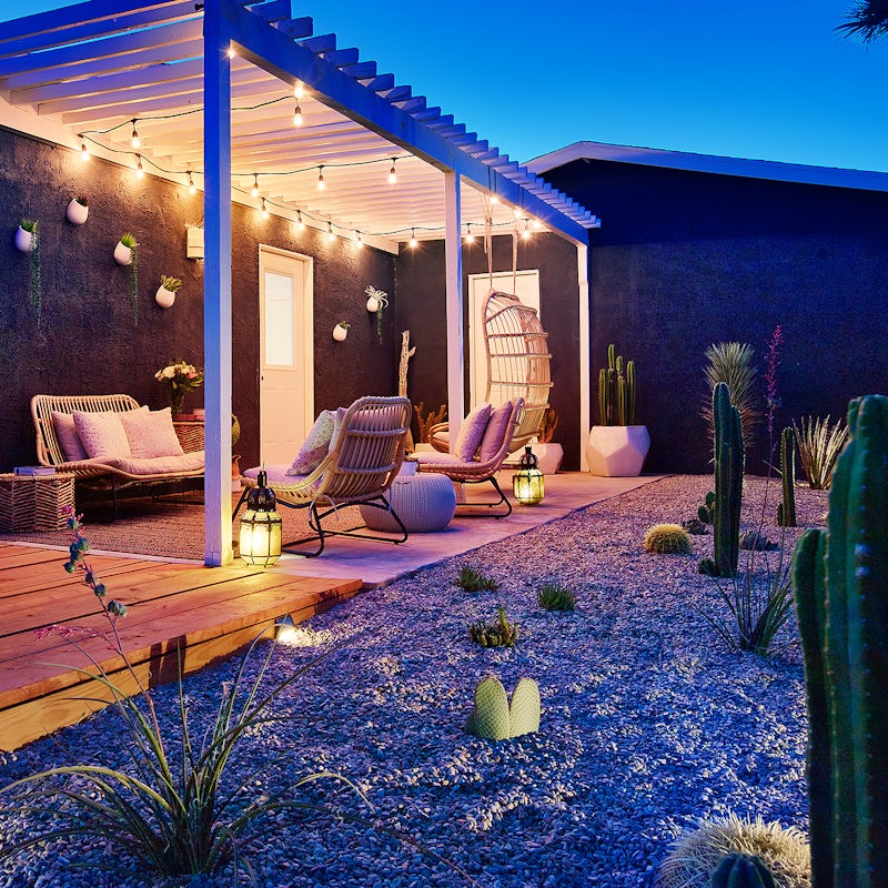 Sit out on the covered veranda as the sun sets over your desert garden