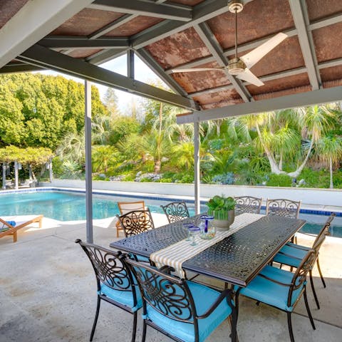 Dine alfresco after a dip in the pool