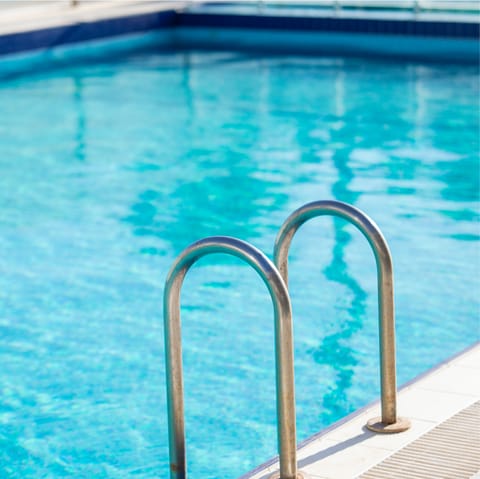 Head up to the building's rooftop infinity pool for a swim with stunning views