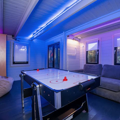 Take to the games room for a friendly air hockey competition