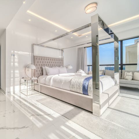 Be submerged in sunlight with the main bedroom's large windows