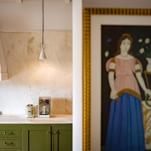 Appreciate this home's country-style kitchen and traditional art pieces