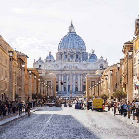 Wander through the medieval streets of Rome's Borgo Pio before marvelling at the scale and beauty of Saint Peter's Basilica