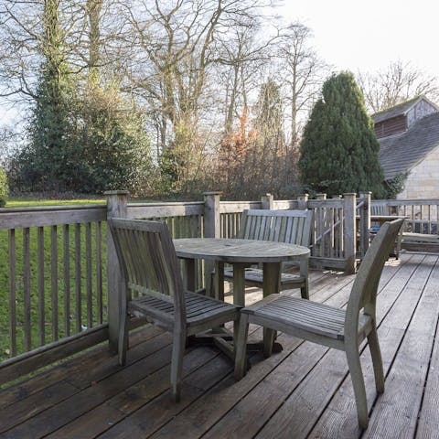 Soak up the woodland views with cuppas on the shared deck outside