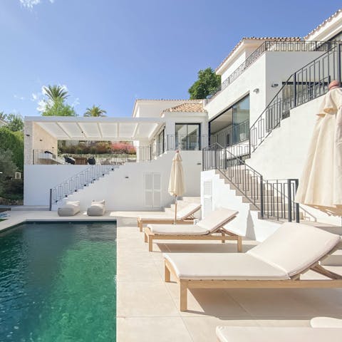 Soak up the sun from the loungers, then cool off in the pool