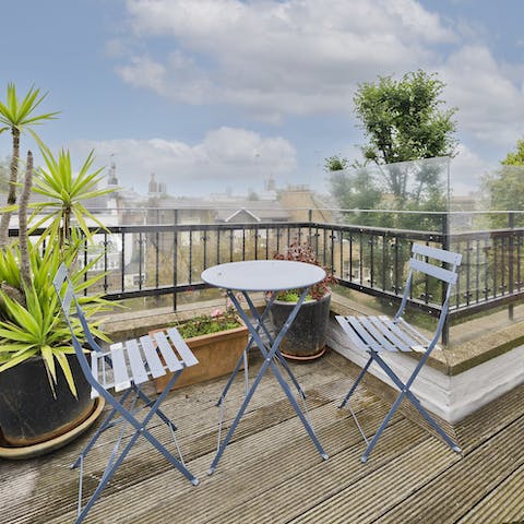 Gaze out at the city's rooftops as you sip your morning coffee from the private terrace