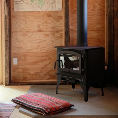 Curl up in front of the wood-burning stove as the evening draws in