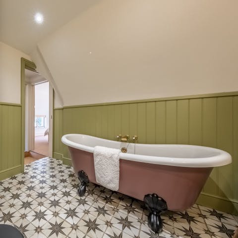 Relax in a freestanding bathtub after touring some National Trust castles
