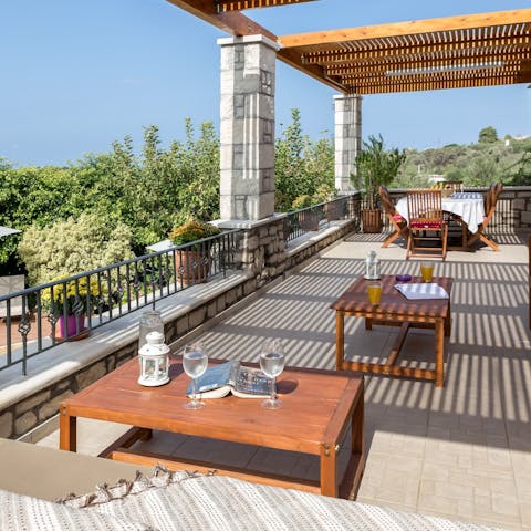 Drink, dine or lounge on your private terrace overlooking the pool