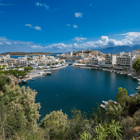 Tuck into lunch overlooking the picturesque lagoon of Agios Nikolaos – half-an-hour from the villa