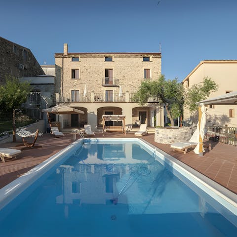 Soak up the sunshine with a relaxing dip in the private pool