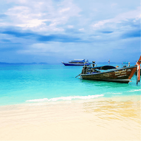 Spend the day on Surin beach or jump on a boat and explore the glistening coastline