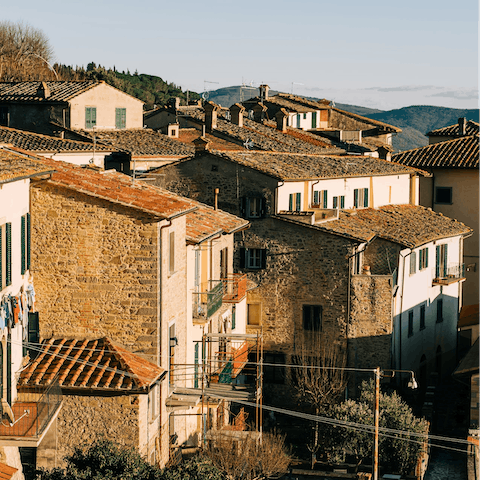 Drive twenty minutes and reach the charming hilltop town of Cortona