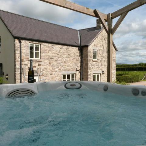 Unwind in the hot tub after a day spend discovering the North Wales coast