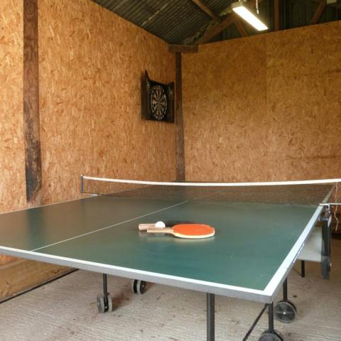 Keep the kids entertained with a round of ping pong in the games room