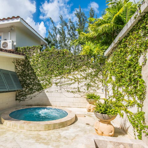 Sink into the hot tub and unwind with a glass of bubbly