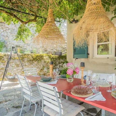 Gather around the table for dinners under the vines