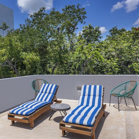 Lie back on the rooftop terrace and soak up the Tulum sunshine