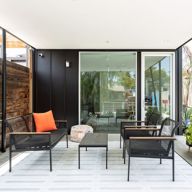 Take shelter during the hottest part of the afternoon on the home's covered terrace