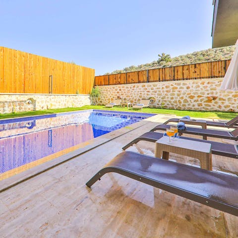 Spend long lazy days sunbathing in the hot Turkish sun on the pool deck