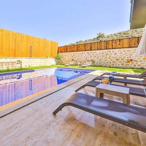 Spend long lazy days sunbathing in the hot Turkish sun on the pool deck