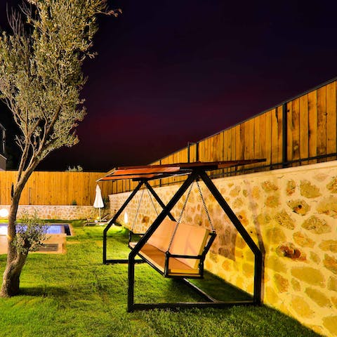Sip a cocktail after-dark on the swinging chair as you listen to the crickets chirp