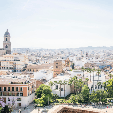 Explore Málaga, and its sandy beaches, at the other end of a thirty-minute drive